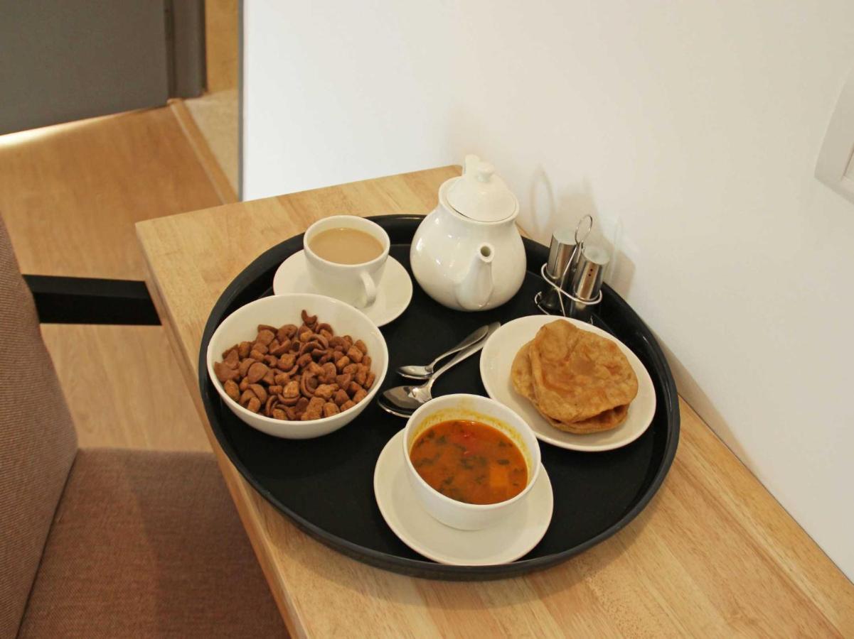 Hôtel Oyo 71675 New Aishwarya Comforts à Bangalore Extérieur photo